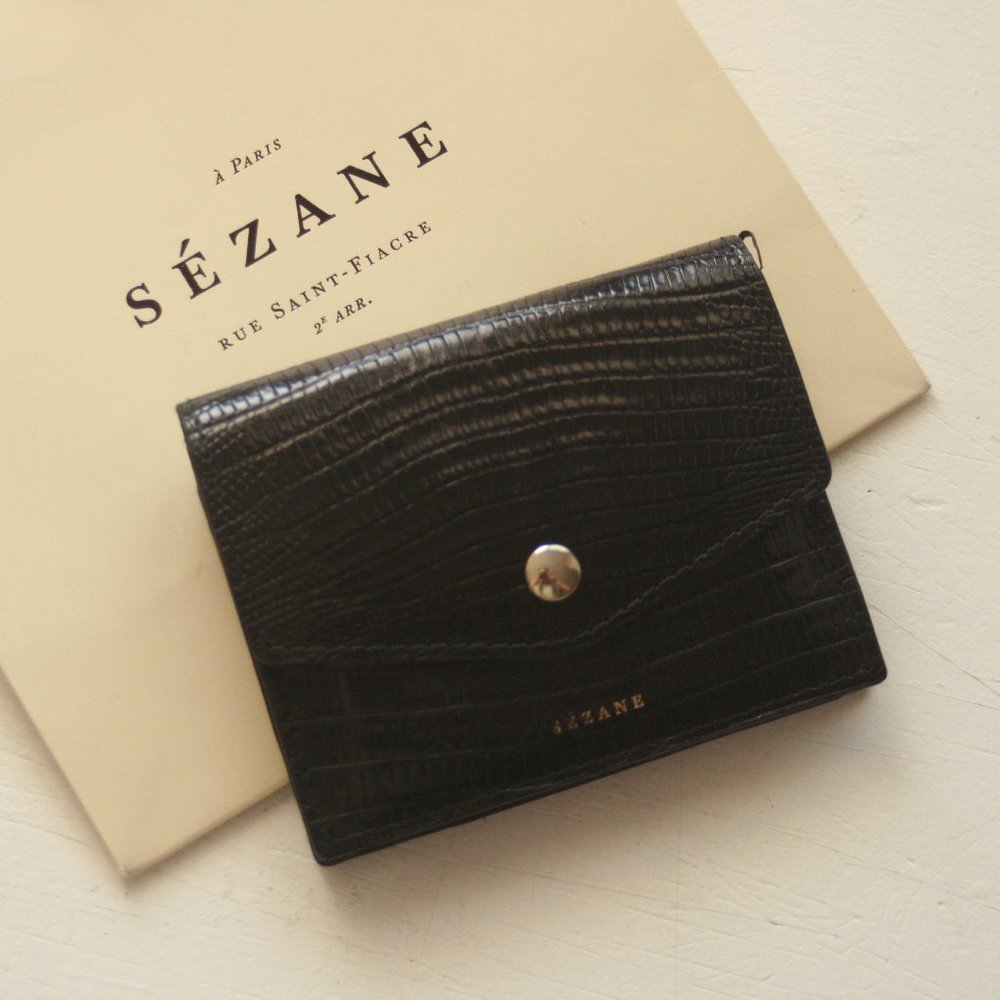 sezane Paris lizard embossed black leather wallet.
